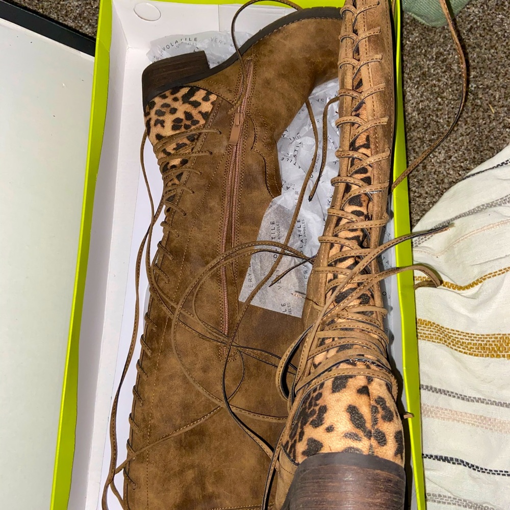 Tall boots leopard in the back strings will wrap around calf